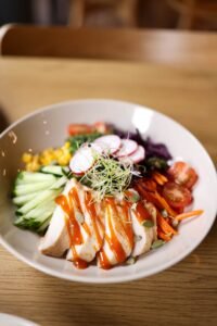 Easy Grilled Chicken Salad Recipe: A Fresh and Flavorful Meal for Any Day Chicken salad bowl with grilled chicken, fresh vegetables, and dressing