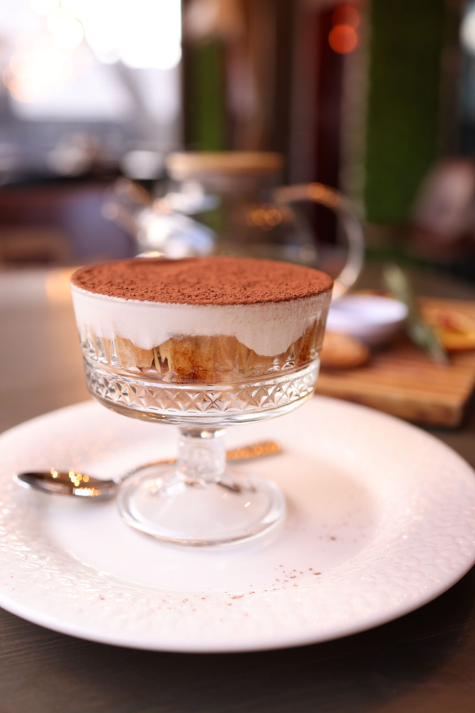 Easy Tiramisu in a Glass: A Creamy Coffee Dessert Tiramisu in a glass with cocoa powder